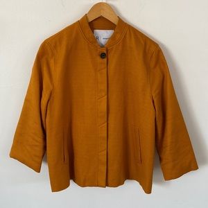 Essentials Women's Collarless Textured Jacket in Rust
